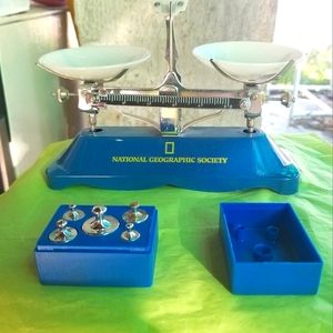 A vintage national geographic society scale with  weighs